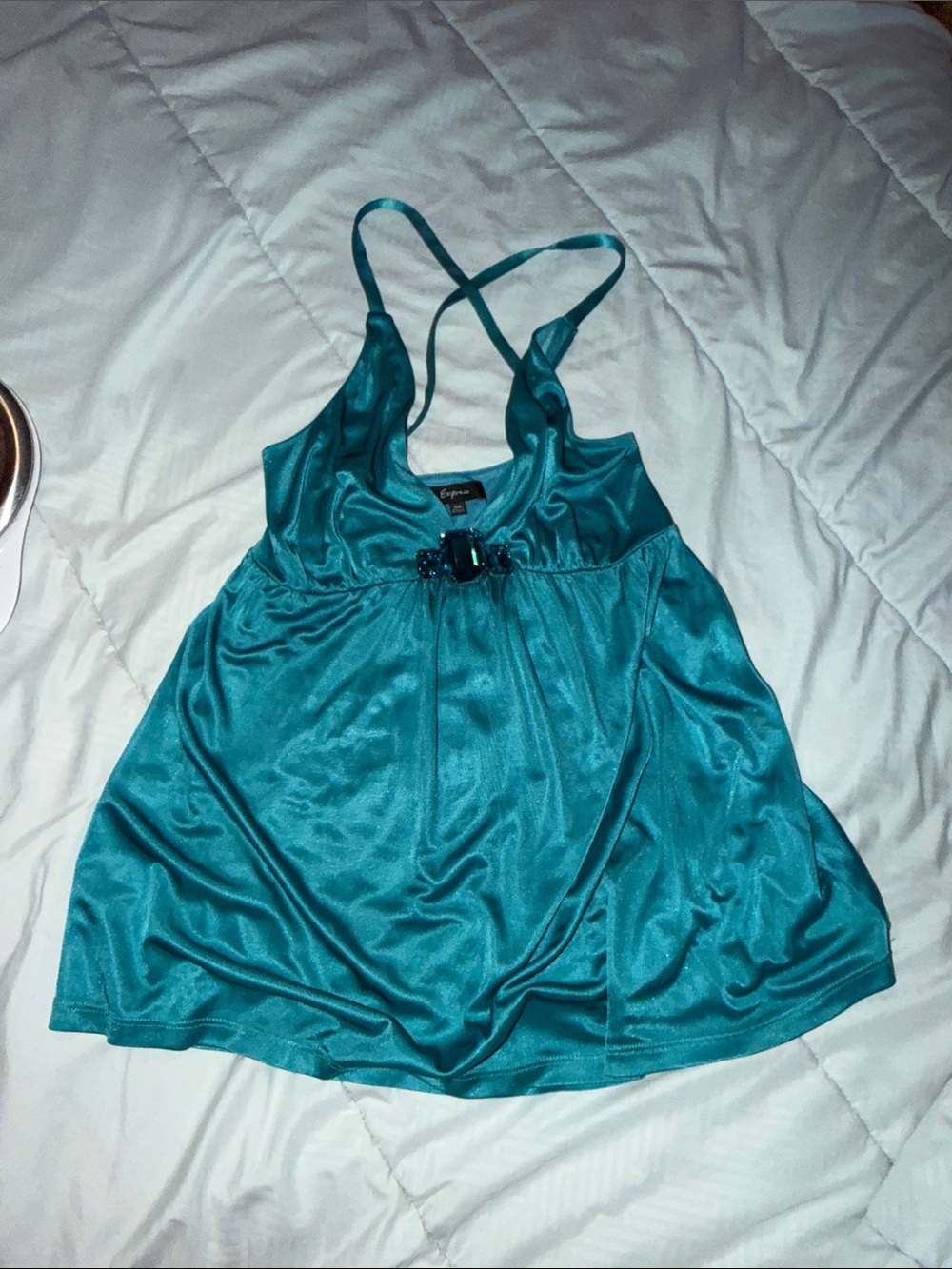 teal satin Express cami top features a vibrant rhinestone jewel embellishment